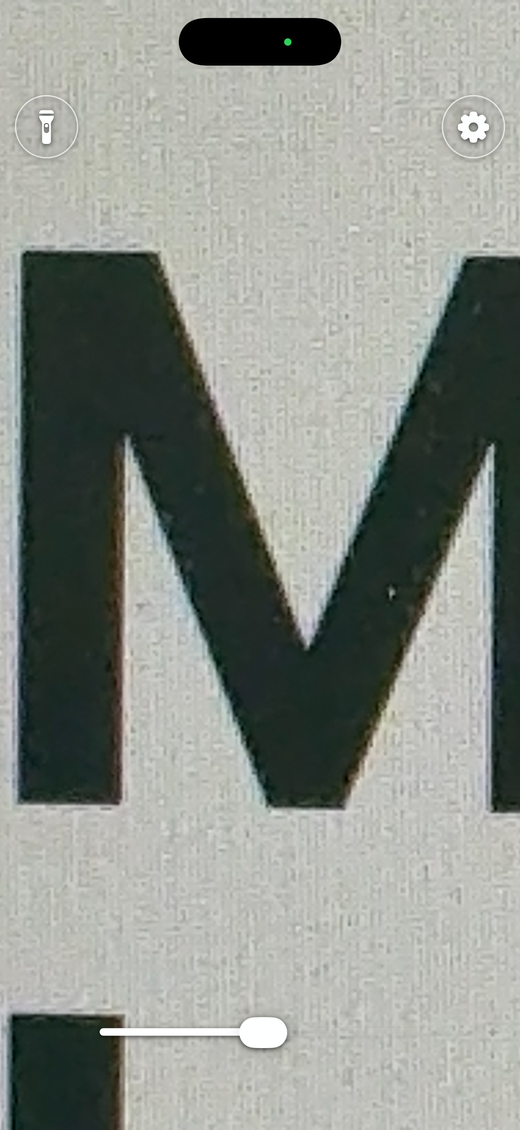 MagGlass showing a live magnified camera view with accessible zoom controls.